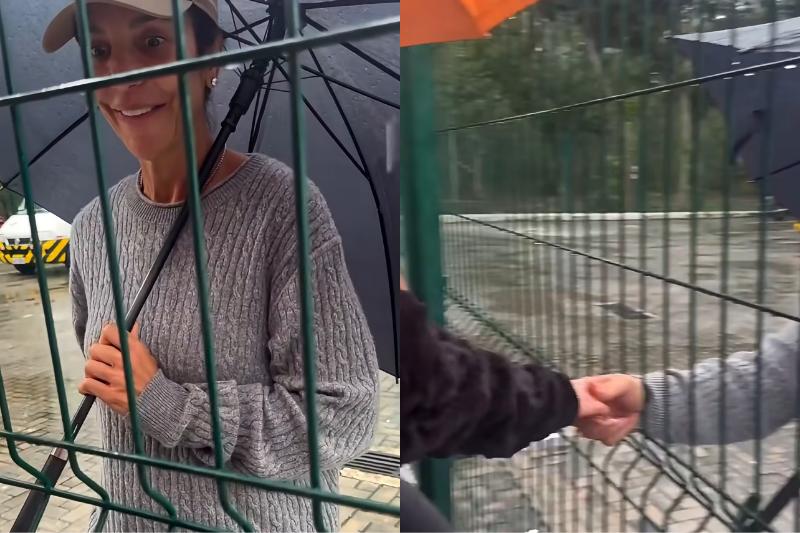 Ivete Sangalo para debaixo de chuva para atender fã mirim